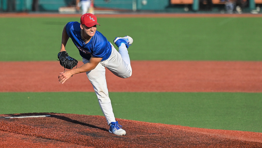 baseball pitcher throwing a ball