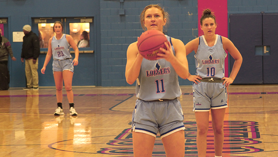 female basketball player shooting free throw