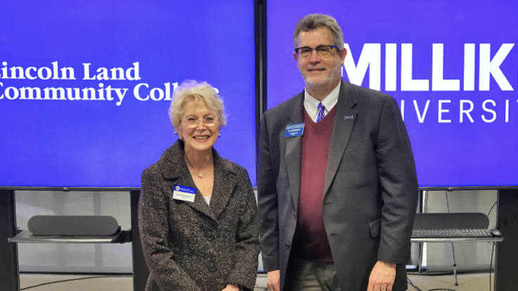 Dr. Charlotte Warren and Dr. Jim Reynolds at partnership signing