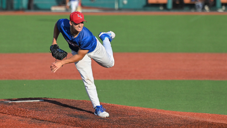 A Loggers pitcher throws the ball from the pitching mound.